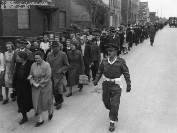 The Population of Burgsteinfurt is Escorted to a Film about the Bergen-Belsen and Buchenwald Concentration Camps (May 30, 1945)